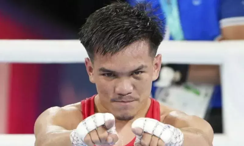 Manipur के बॉक्सर जादुमणि सिंह मंडेन्गबम ने कॉमनवेल्थ गेम्स 2026 में सिल्वर मेडल जीता Manipur के बॉक्सर जादुमणि सिंह मंडेन्गबम ने कॉमनवेल्थ गेम्स 2026 में सिल्वर मेडल जीता
