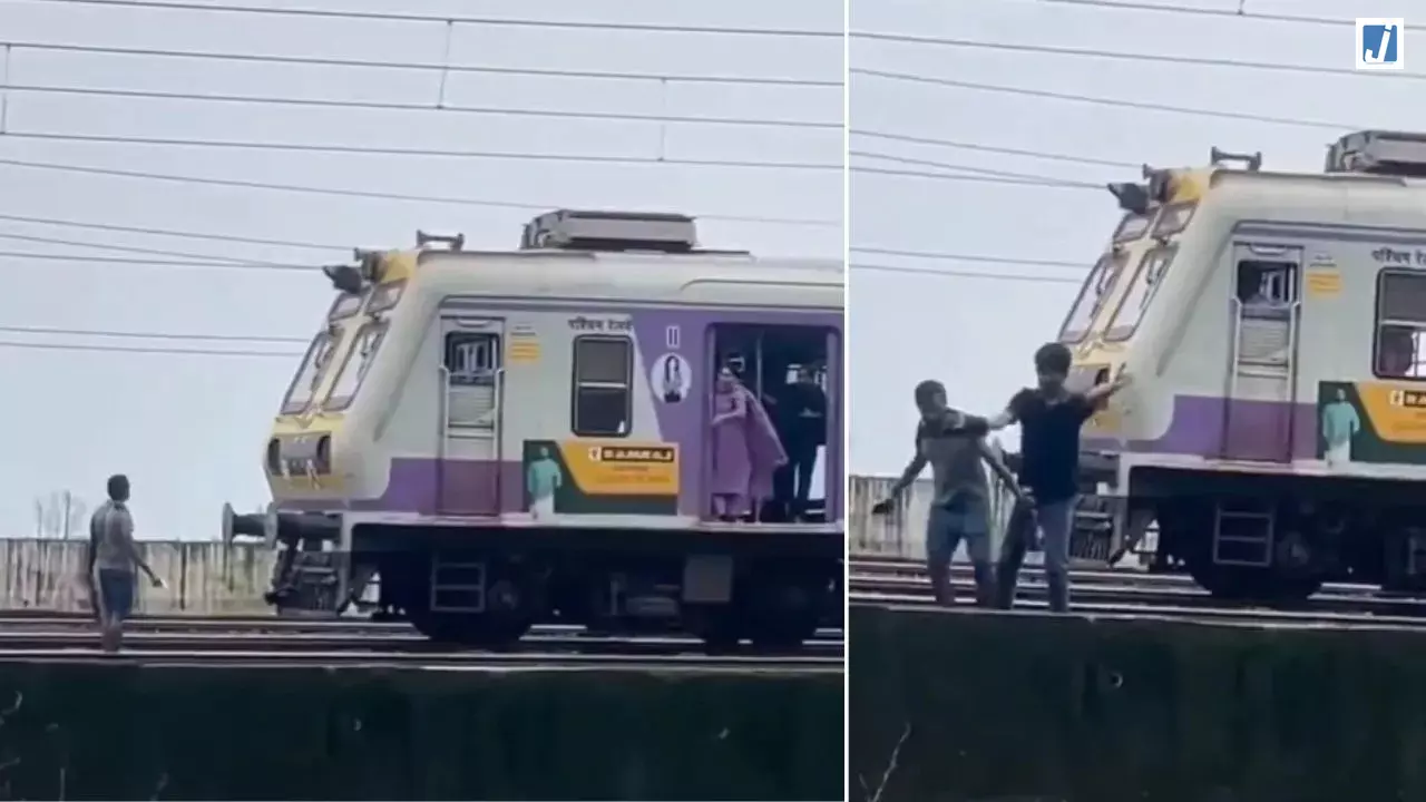 VIDEO: चलती लोकल के सामने मौत बनकर खड़ा हो गया युवक... फिर जो हुआ, देखकर दहल जाएंगे VIDEO: चलती लोकल के सामने मौत बनकर खड़ा हो गया युवक... फिर जो हुआ, देखकर दहल जाएंगे