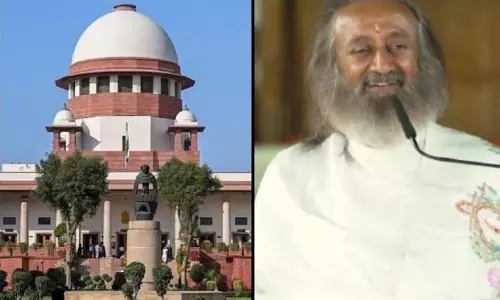 NGT का फैसला रद्द, आर्ट ऑफ़ लिविंग को मिली सुप्रीम कोर्ट से क्लीन चिट NGT का फैसला रद्द, आर्ट ऑफ़ लिविंग को मिली सुप्रीम कोर्ट से क्लीन चिट