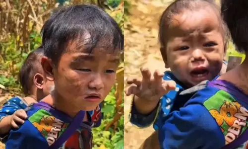 पीठ पर बहन को लेकर निकला बच्चा वीडियो वायरल पीठ पर बहन को लेकर निकला बच्चा वीडियो वायरल