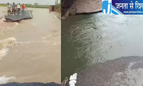 तेज बहाव में बह गई सड़क 100 साल पुराना पेड़ भी उखड़ा