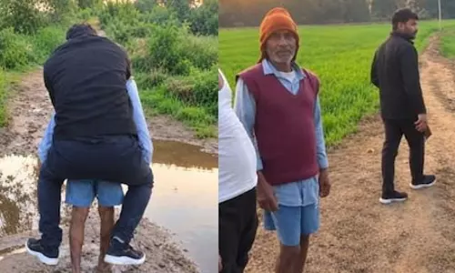 पटवारी का शर्मनाक वीडियो वायरल, बुजुर्ग की पीठ पर बैठकर पार किया नाला पटवारी का शर्मनाक वीडियो वायरल, बुजुर्ग की पीठ पर बैठकर पार किया नाला