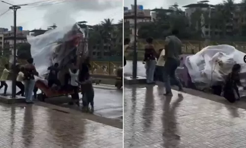 बारिश में अचानक गिरी गणेश प्रतिमा बाल-बाल बचे कई भक्त बारिश में अचानक गिरी गणेश प्रतिमा बाल-बाल बचे कई भक्त