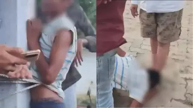 चोरी के शक में नाबालिग को पिलर से बांधकर पीटा चोरी के शक में नाबालिग को पिलर से बांधकर पीटा