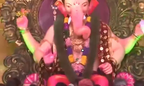 गणेश उत्सव में पहुंचे राजनाथ सिंह गणपति प्रतिमा का किया अनावरण