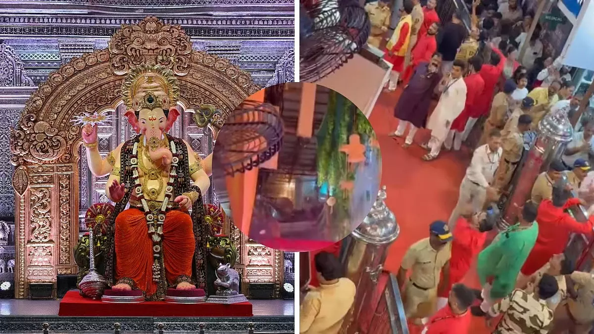 मुंबई के लालबागचा राजा पंडाल में शॉर्ट सर्किट से मची अफरातफरी मुंबई के लालबागचा राजा पंडाल में शॉर्ट सर्किट से मची अफरातफरी