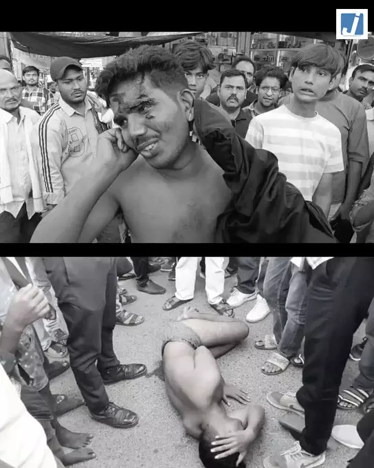 झांसी में लड़की से छेड़छाड़ का आरोप, भीड़ ने युवक को सड़क पर पीटा झांसी में लड़की से छेड़छाड़ का आरोप, भीड़ ने युवक को सड़क पर पीटा