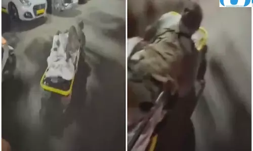 चलती एम्बुलेंस से सड़क पर गिरा मरीज, VIDEO आया सामने